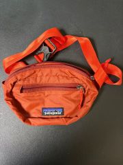 【新品同様】patagonia オレンジ ボディバッグ patagonia ボディバッグ ミニサイズ - メルカリ