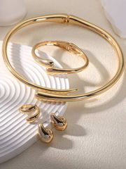 Women's Jewelry Set for Valentine's Day: 5-piece set including 1 symmetrical double teardrop design cuff bracelet, 1 vintage geometric teardrop crossover ring, 1 teardrop necklace, and 1 teardrop earring.