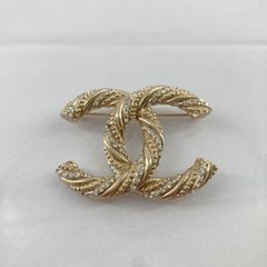 CHANEL ゴールドトーンツイストブローチ - メルカリ