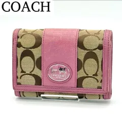 【美品】COACH 二つ折り財布 シグネチャー キャンバス レザー ピンク系