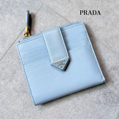 PRADA サフィアーノ トライアングル ライトブルーカードケース - メルカリ