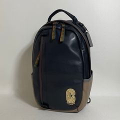美品COACH リフレクティブ エッジ レザー バックパック ネイビー定価9万円 美品COACH リフレクティブ エッジ レザー バックパック ネイビー定価9