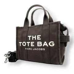 マークジェイコブス MARC JACOBS ザ トートバッグ THE TOTE BAG キャンバス ブラウン ブラック 茶 黒 2WAY ショルダー バッグ ハンドバッグ 斜め掛け可 クロスボディ 自立可 レディース カジュアル ロゴ デザイン S75