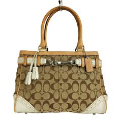 COACH シグネチャー ハンドバッグ タッセル付き - メルカリ