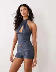 モーテル レディース ボトムス ハーフパンツ・ショーツ ミニ ショートパンツ ジャージー Motel Gojo grommet jersey mini shorts in ocean storm part of a set OCEAN STORM