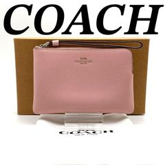 新品 COACH コーチ ロボット柄 ラウンドファスナー 長財布 - メルカリ