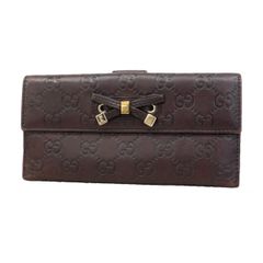 美品✨グッチ◇タブ二つ折り財布 シマダークブラウンゴールド金具