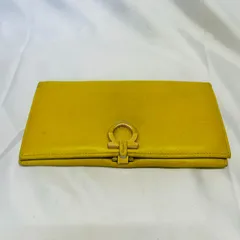 S【中古】サルバトーレ・フェラガモ　ゴールドクリップイエローレザー長財布　箱なしのサムネイル