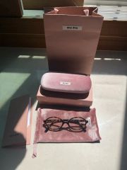 miu miu リムレスサングラス ケースポーチ付 - メルカリ