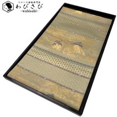 志ま亀　名古屋帯 鶸色 糸巻き文様 縮緬 志ま亀 名古屋帯 鶸色 糸巻き文様 縮緬 - メルカリ