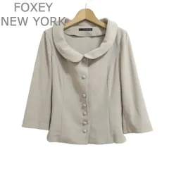 美品 FOXEY NEW YORK フォクシーニューヨーク ノーカラージャケット ジャケット 2WAY 襟付き シングル 七分袖 ポリエステル ベージュ サイズ40 レディースのサムネイル