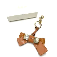Chloe クロエ　リボン　バッグチャーム　キーホルダー　キーリング　キーチャーム　エナメル　パテント　ピンクベージュ系のサムネイル