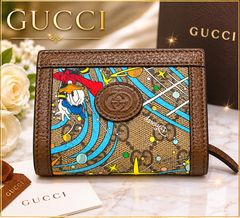 GUCCI Disney ドナルドダック ラウンドファスナー 長財布 - メルカリ