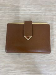 未使用保管品 イヴサンローラン 折り財布 がま口 ロゴ刻印 レザー