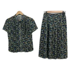AMACA(アマカ) スカートセットアップ レディース美品  - ダークネイビー×白×マルチ 花柄/ボウタイ/シースルー/LIBERTYのサムネイル