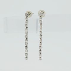 新品✨K18WG ダイヤモンド ツイストフープピアス 0.10ct 18金 - メルカリ