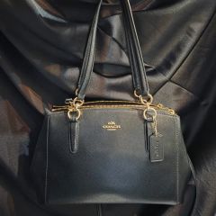 COACH バイカラースモールクリスティキャリオール - メルカリ