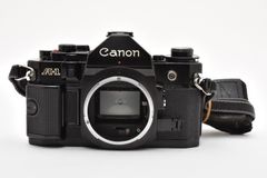 完動品】Canon A-1 ボディ 純正キャップ・ストラップ・電池付 - メルカリ