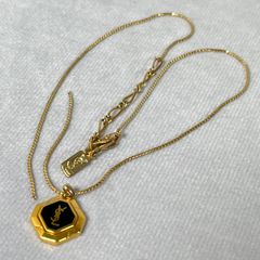 イヴ・サンローラン ネックレス ロゴ ゴールド カサンドラ - メルカリ
