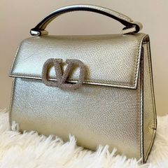 미사용급 valentino 발렌티노 V 슬링 보석 핸드백 골드 메탈릭 가죽