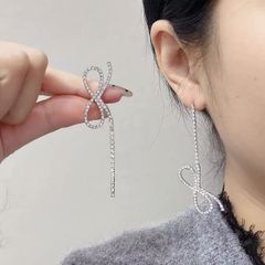 ピアス シルバー リボン ロング 揺れる 結婚式 ブライダル キラキラ