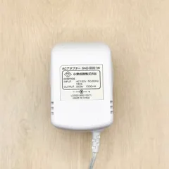SAD-9001 KOIZUMI コイズミ 小泉成器 純正 ACアダプター 電源アダプタ CDプレーヤー ステレオCDシステム CDラジオ ポータブルCD ラジカセ 音響機器 9V 1A プラグ外径 約 3.5mm センタープラス 60-80530-033のサムネイル