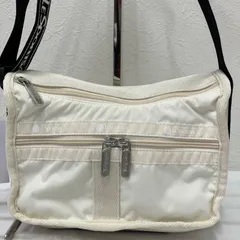 4041【良品】 LeSportsac　レスポートサック　ショルダーバッグ　 紐調節可能　SMALL EVERYDAY BAG　ロゴジャガードメレンゲ　 ロゴジャガードウェビングコレクション　マチ拡張　 アイボリー×ブラック系　ナイロン　軽量　レディース