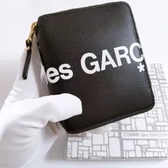 訳あり【新品未使用・ヨーロッパ輸入品】COMME des GARCONS 二つ折り財布 Huge Logo 小銭入付 コムデギャルソン ユニセックス（メンズ・レディース） サイフ レザーのサムネイル