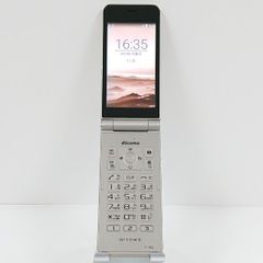 3-768 docomoらくらくホンF-01Mホワイト4Gガラケー卓上充電器付き