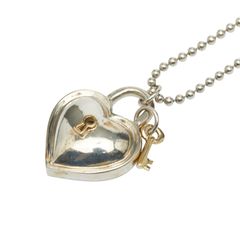 TOUS ハート形 ペンダントトップ 750刻印 - メルカリ