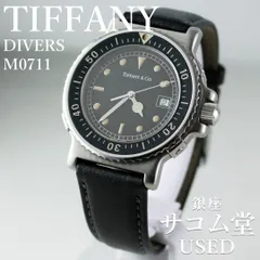 TTS-119	TIFFANY & Co. DIVERS M0711 ダイバーズウォッチ ブラック文字盤 デイト クオーツ メンズ 腕時計 ティファニー ヴィンテージ 革ベルト 希少モデル 銀座サコム堂【中古】のサムネイル