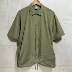 new balance ニューバランス 半袖 コーチジャケット シャツ ナイロン M ロゴ ワンポイント ドローコード オリーブ グリーン メンズ SU-27-22のサムネイル
