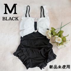 Brand new women's one-piece swimsuit with ruffles and ribbons, black and white, size M, for body coverage.