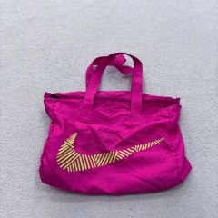 NIKE ナップサック ピンク 巾着型 リュック - メルカリ