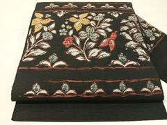 西陣織九寸帯未仕立品 弥栄織物墨黒地縦花蔓文 芯入仕立代込み - メルカリ