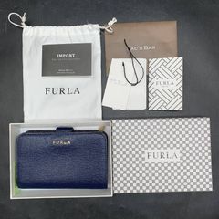 未使用FURLA 二つ折り財布 グレー ジュ保存袋付き FURLA 二つ折り財布 グレージュ 箱・保存袋付き - メルカリ