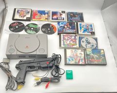 A complete set of the original PlayStation console, peripherals, and classic retro game software.