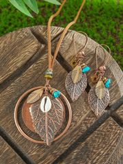 Women's Bohemian Vintage Brown Jewelry Set: 1 set includes 1 pair of geometric leaf-shaped metal earrings and 1 double-layered pendant necklace with round wood, shell, and turquoise accents.