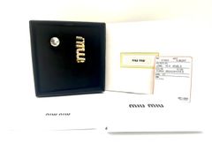 miu miu ロゴ リング ジルコニア 指輪 11号 - メルカリ