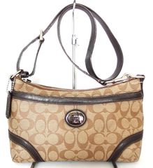 COACH アクセサリーポーチ シグネチャー ターンロック ブラウン 11057
