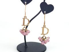 Christian Dior フラワーモチーフ Dロゴ ピアス - メルカリ