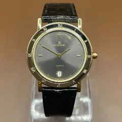 ◎【✨希少✨】腕時計　EDOX　エドックス　型番　71123　スイス製　高級　アンティーク　ヴィンテージ　クォーツ　電池式　カラー　金　銀　ゴールド　シルバー　黒　ブラック　文字盤　丸形　ラウンド　デイト　日付　表示　機能付き　革　レザー　ベルト　バンドのサムネイル