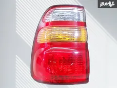 トヨタ 純正 HDJ101 UZJ100W 100系 ランドクルーザー ランクル テールライト テールランプ レンズ 左 左側 助手席側 KOITO 60-70 即納 棚のサムネイル