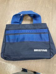 美品】BRIEFING ラウンドバッグ ネイビー - メルカリ