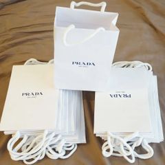 PRADA RE-NYLON ノベルティグッズ プラダワッペン 袋&冊子付き - メルカリ