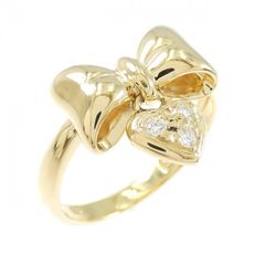 リボンモチーフ ハートシェイプダイヤモンド0.39ct Pt900 リング 