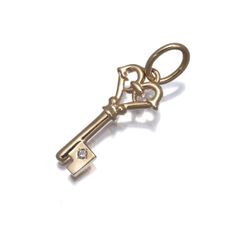 アガット k10 YG 鍵モチーフ　ペンダントトップ　ダイヤモンド0.01ct agete k10 YG 鍵モチーフ ペンダントトップ ダイヤモンド0.01ct - メルカリ