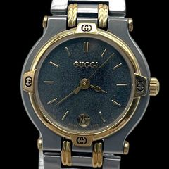 稼働 GUCCI 9000L レディース クォーツ コンビ ゴールド 黒文字盤
