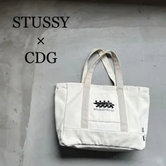 『STUSSY × CDG』ステューシー × シーディージー コムデギャルソン キャンバストート サーフマン 40周年限定品のサムネイル