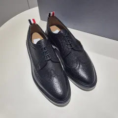 新品 Thom Browne トム・ブラウン ブラック ペブルグレイン Classic ロングウィング ブローグ シューズ 260のサムネイル